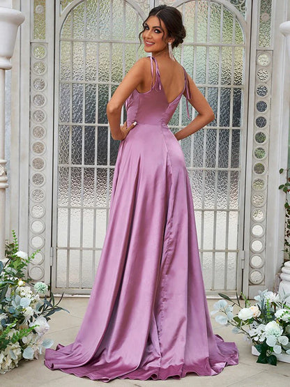 Side profile of a sleeveless A-Line bridesmaid dress with delicate ruffles.