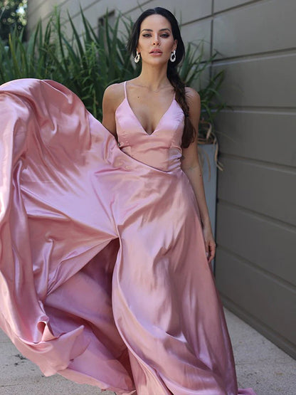 Front view of an elegant A-line V-neck ruffled sleeveless dress in silk-like satin.