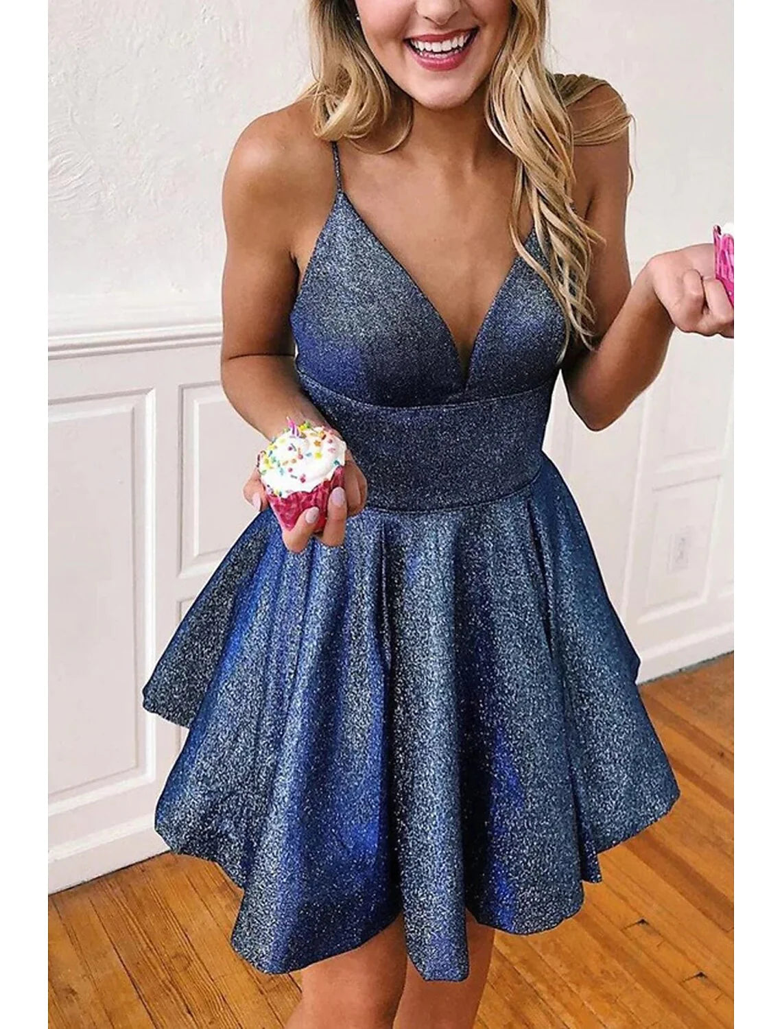 Model wearing a short A-line V-neck satin backless cocktail dress.