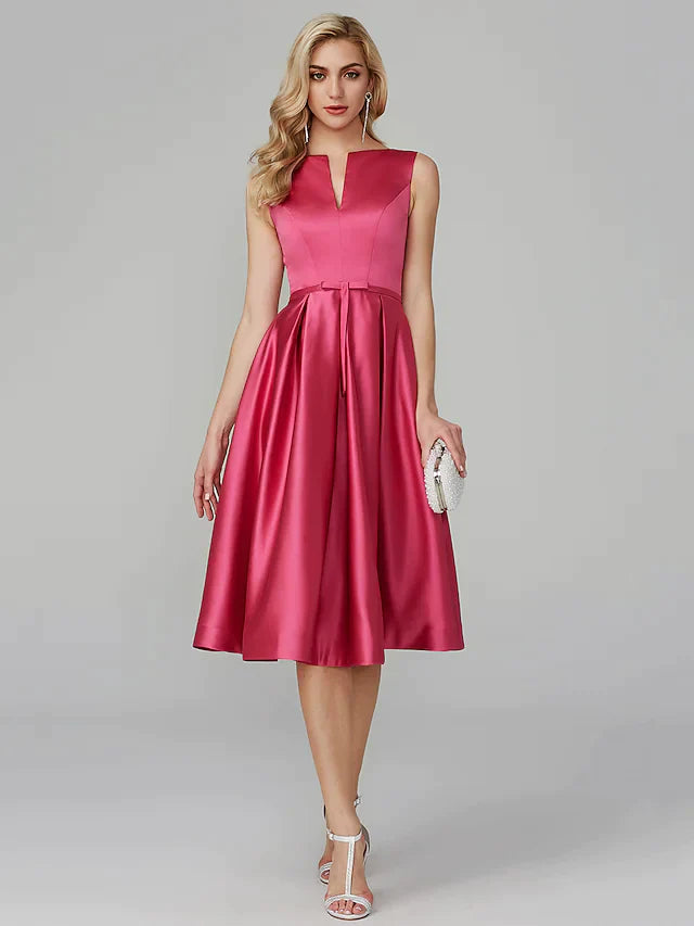 Woman wearing an elegant red A-line satin cocktail dress with a V-neck and sash ribbon.