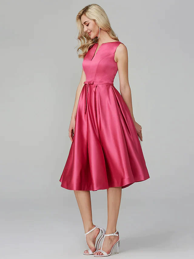 Side profile of a woman in a knee-length red A-line satin party dress.