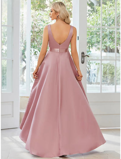 Side view of a model posing in a solid color A-line V-neck sleeveless satin ruffle midi dress.