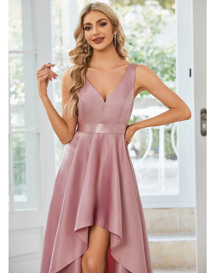 Close-up of the luxurious satin fabric and delicate ruffle detail on the midi dress.