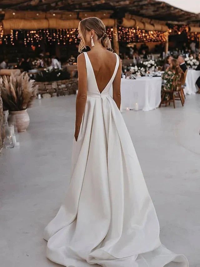 Back view of A-Line satin wedding dress with court train.