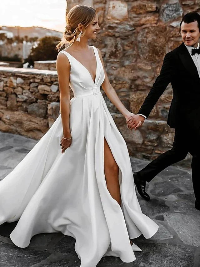 Side view of A-Line V-neck wedding dress showing split front detail.