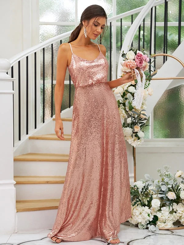 Close-up of the sequined bodice and ruched V-neck straps on the A-line dress.