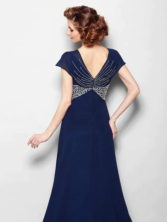Side profile of the mother of the bride gown, highlighting its flowing A-line silhouette.