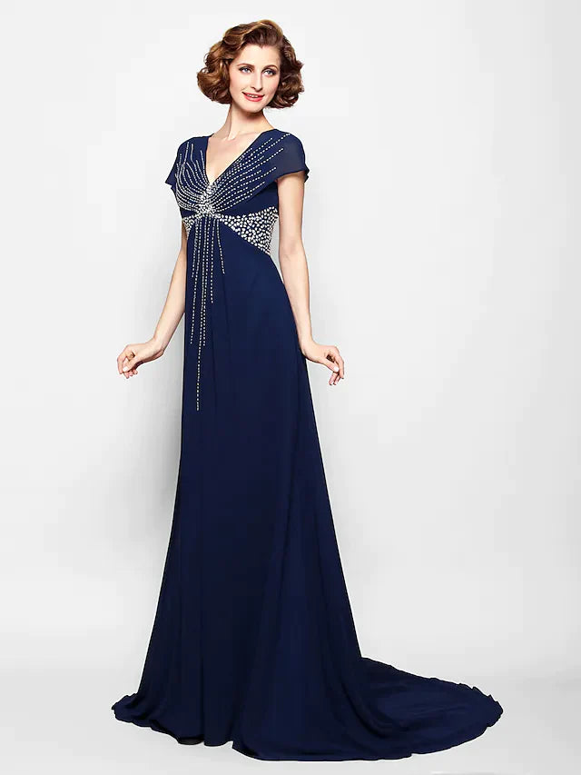 Detailed view of the shimmering sequin and bead embellishments on the dress bodice.