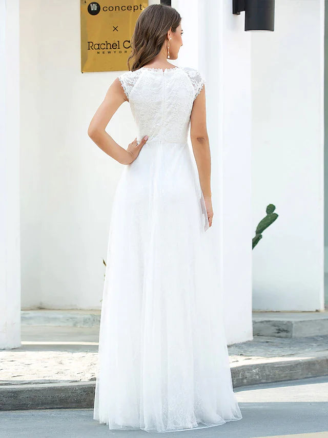 Side view of an A-line V-neck short sleeve lace tulle wedding dress.