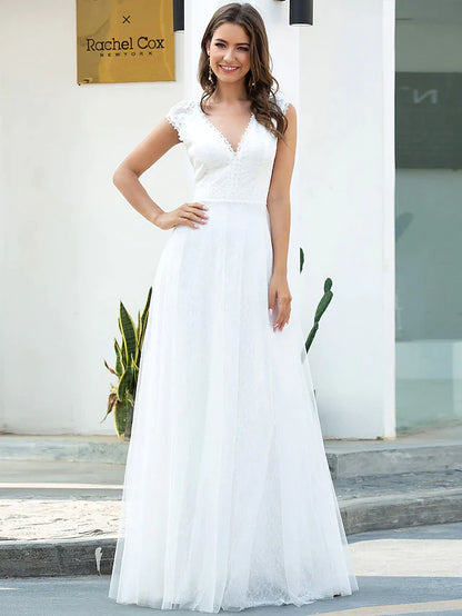 Close-up of delicate lace details on the A-line V-neck wedding dress.