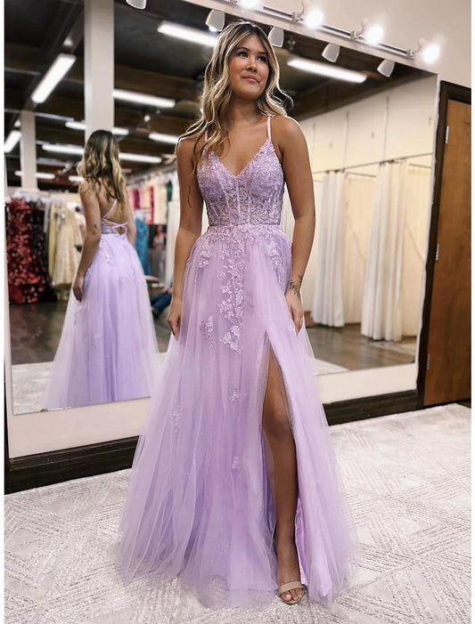 Model in elegant light blue A-line V-neck evening gown with open back and beading.