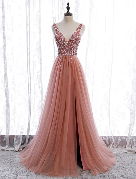 Full-length view of an elegant A-line prom dress with a V-neck, sleeveless design, and pearl embroidery, featuring a court.
