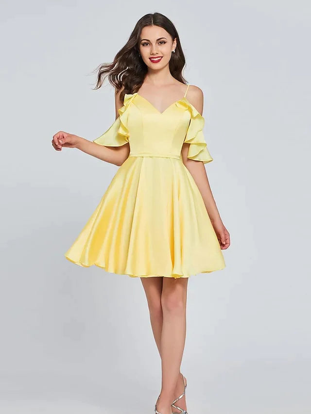 Model wearing a light pink A-line V-neck sleeveless satin pleated knee-length cocktail dress.