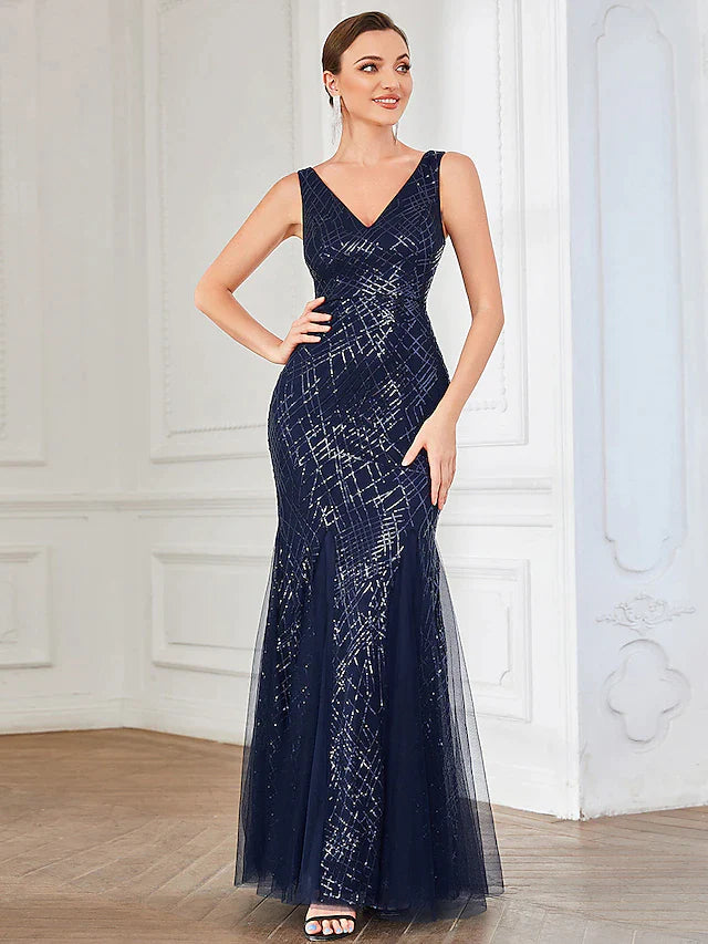 Close-up of the sequin and tulle fabric detail on the elegant dress.