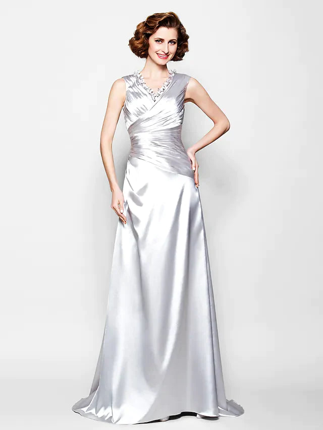 Back view of the A-line sleeveless dress, highlighting the draping detail.