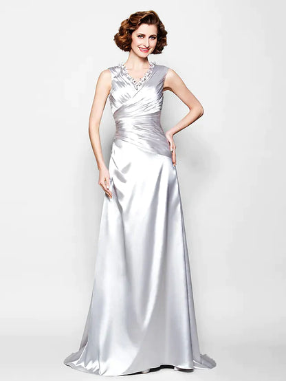 Back view of the A-line sleeveless dress, highlighting the draping detail.