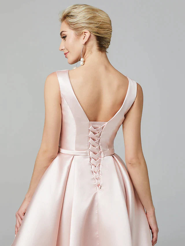 Full view of a knee-length A-line satin dress with pleats.