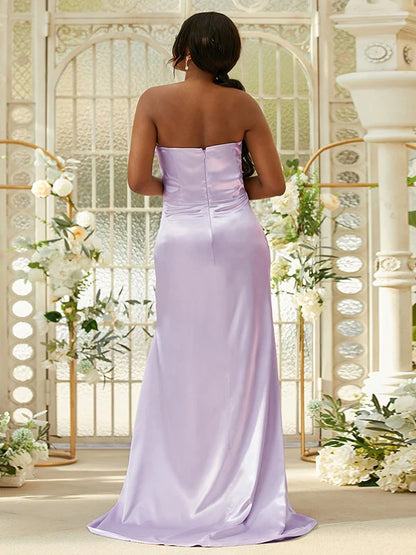 Side view of the flowing purple A-line bridesmaid dress, showcasing its graceful silhouette.