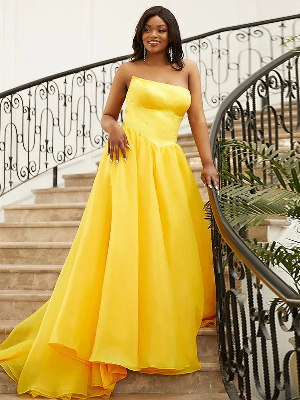 Elegant aqua blue A-line princess satin prom dress with ruffles and strapless neckline.