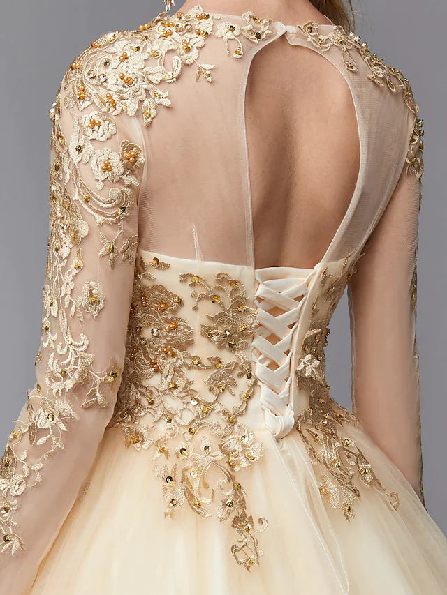 Fabric detail of the lace and tulle on the wedding dress.