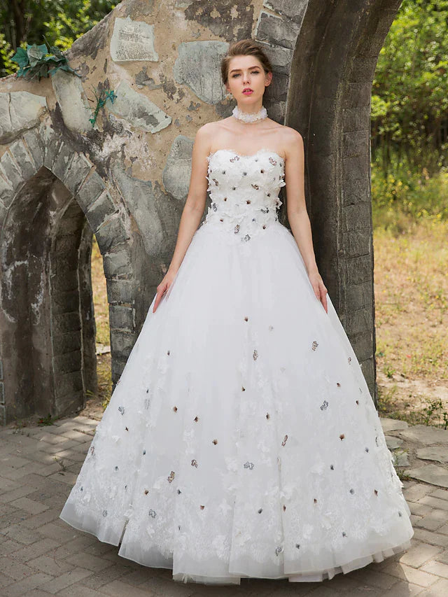 Bridal portrait showing the sweetheart neckline and overall silhouette of the gown.
