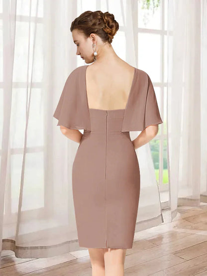 Model showcasing the back of an elegant jewel neck short sleeve ruffled chiffon mini dress.