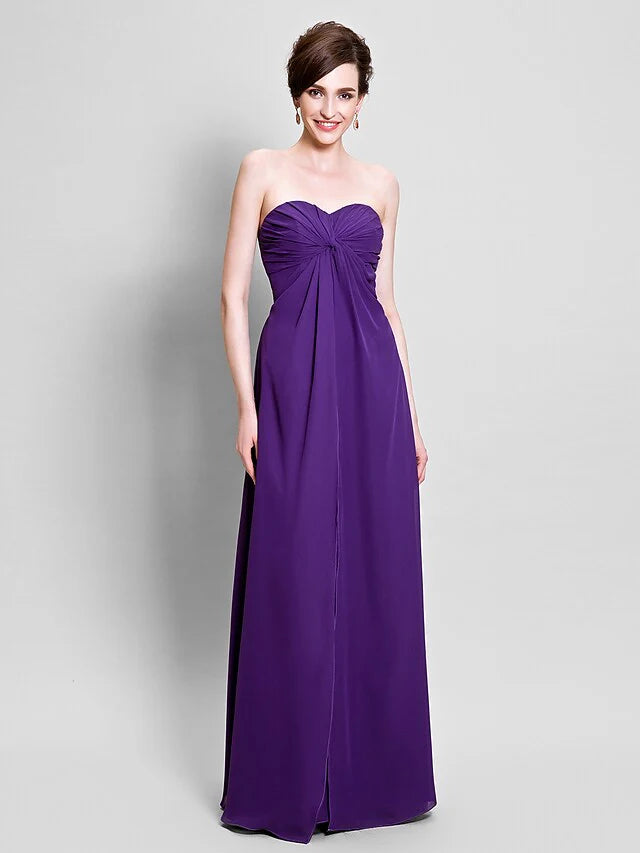 Back view of the sleeveless chiffon gown, showing elegant flow.