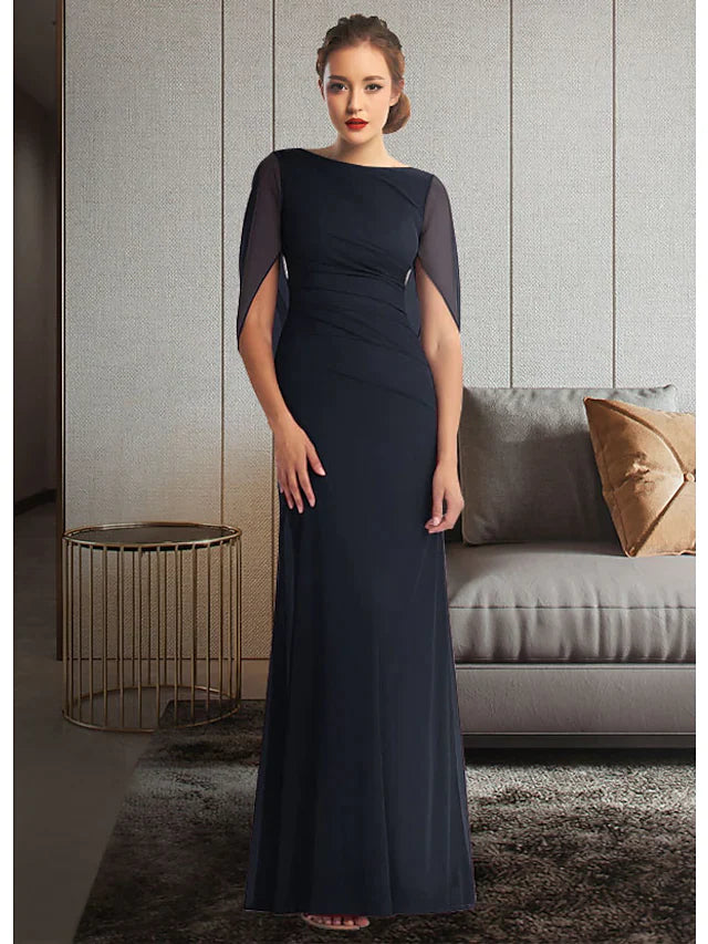 Woman wearing an elegant jewel neck, half-sleeve, ankle-length chiffon Mother of the Bride dress with pleats and ruching.