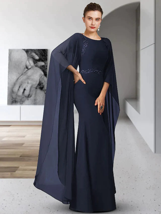 Elegant mother of the bride dress in chiffon with jewel neck and long sleeves, featuring delicate appliques.