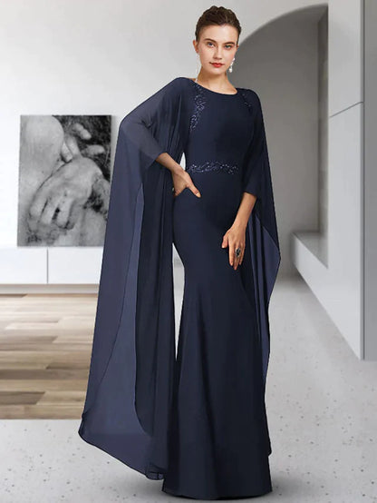 Elegant mother of the bride dress in chiffon with jewel neck and long sleeves, featuring delicate appliques.
