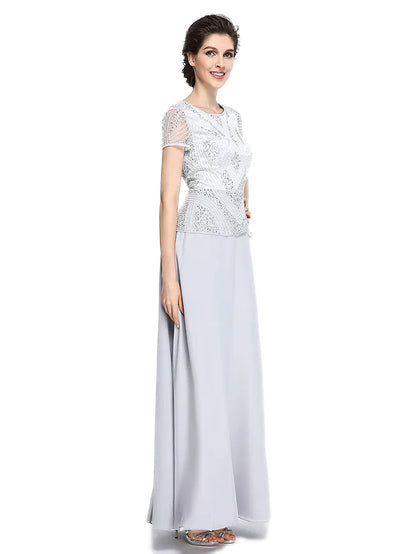 Back view of the floor-length mother of the bride gown, showcasing the intricate beading and sequin details.