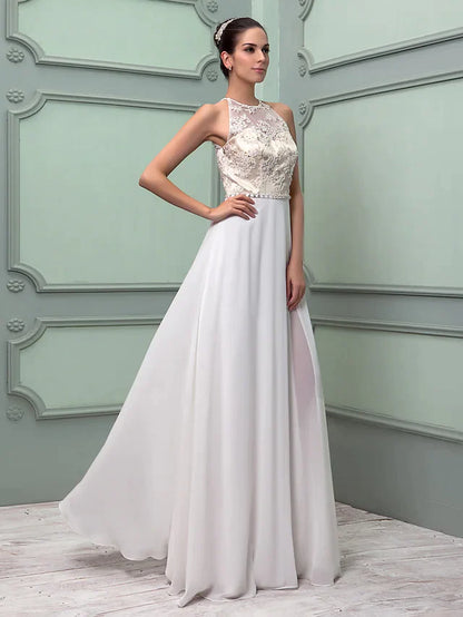 Back view of the elegant white chiffon lace wedding dress, showing the regular straps and flowing train.