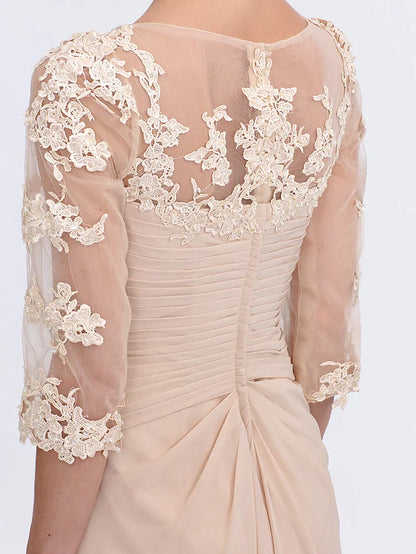 Front view of a model in a dark blue Mother of the Bride dress with a graceful silhouette.