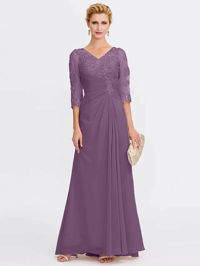 Detail of the side draping and texture of the dark blue chiffon Mother of the Bride dress.