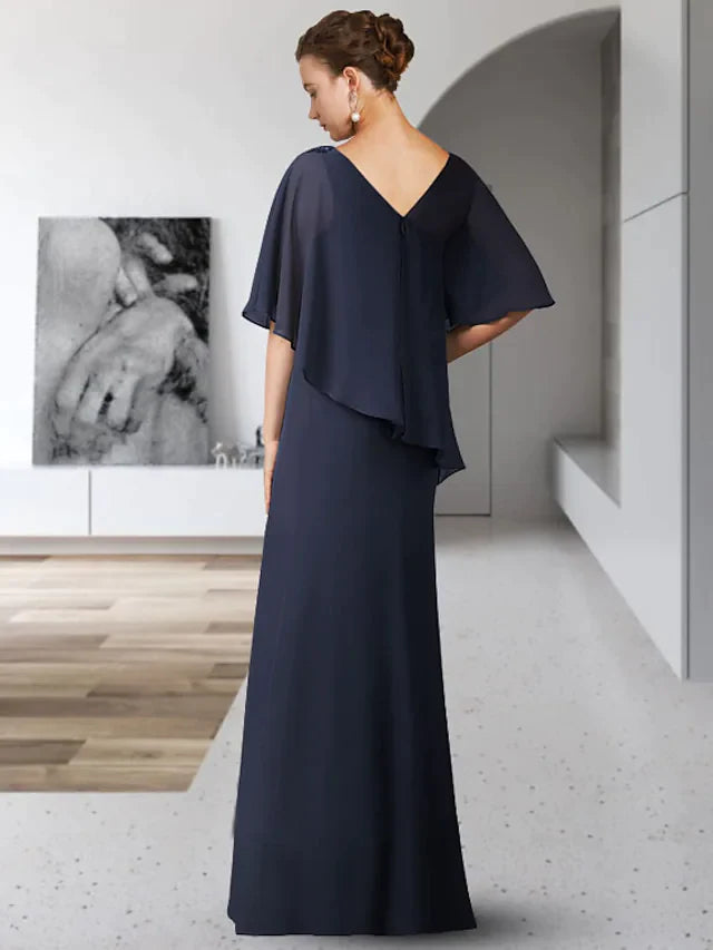 Side view of an elegant V-neck, half-sleeve, floor-length chiffon mother of the bride dress with ruffles.