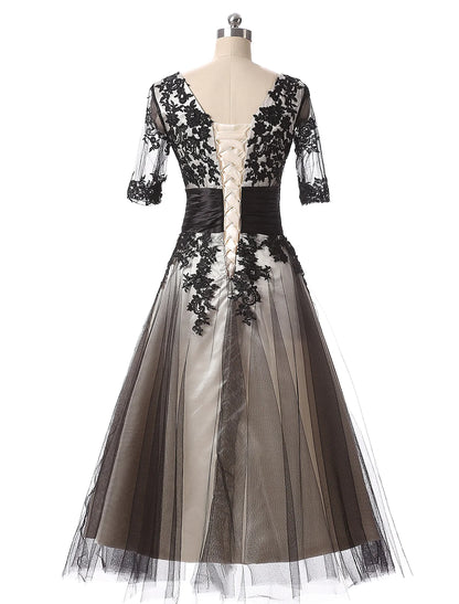 Back view of the jewel neck half sleeve ball gown.