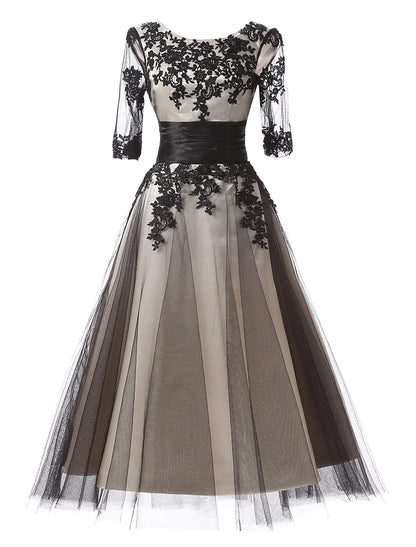 Close-up of the lace and color block detail on the formal dress.
