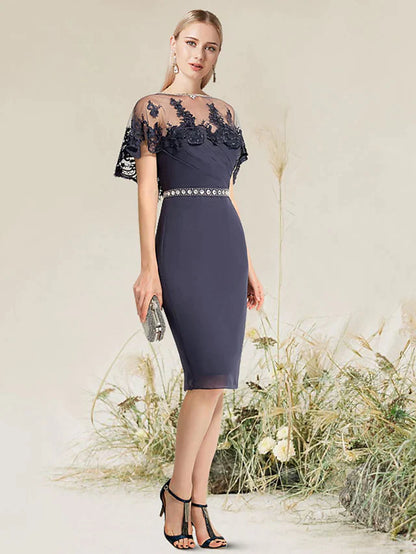 Close-up of intricate lace and applique details on the elegant dress.