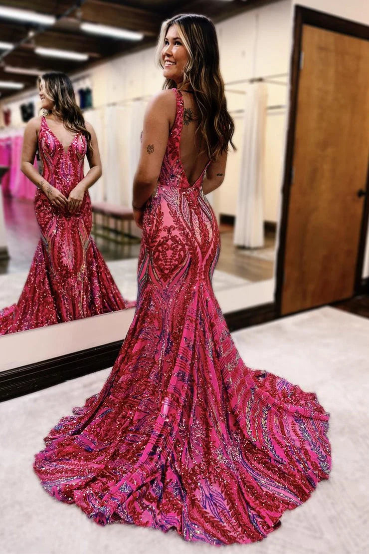 Close-up of the dark red sequin fabric on a mermaid prom dress.