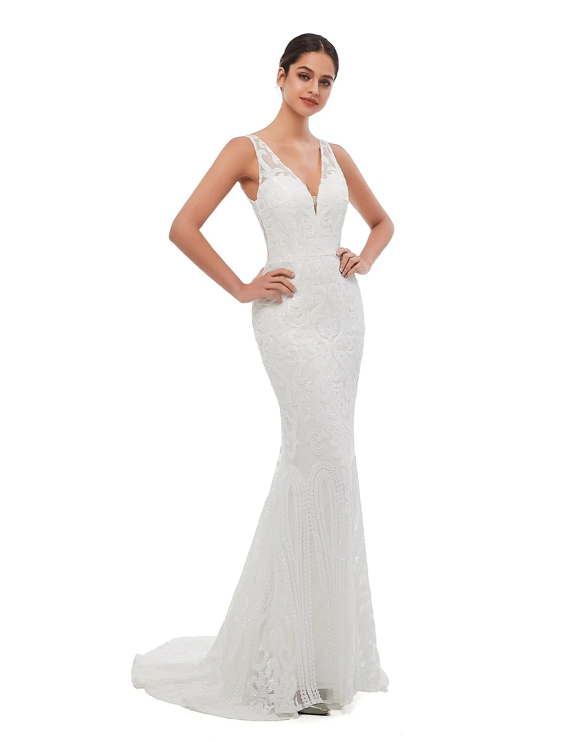 Side profile of a woman wearing the sequin evening dress, highlighting its mermaid silhouette.