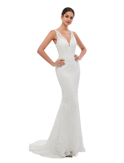 Side profile of a woman wearing the sequin evening dress, highlighting its mermaid silhouette.