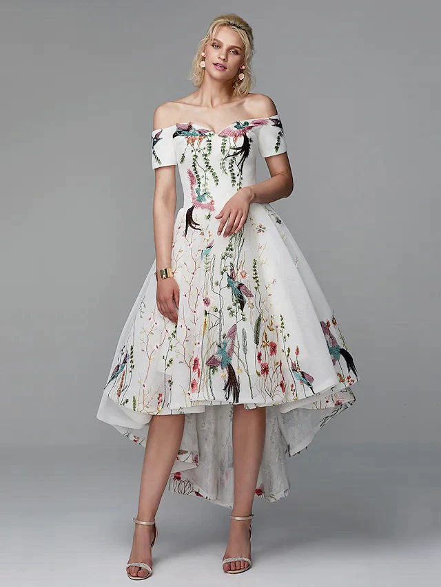 Model in elegant light blue floral embroidered off-shoulder high-low ball gown, front view.