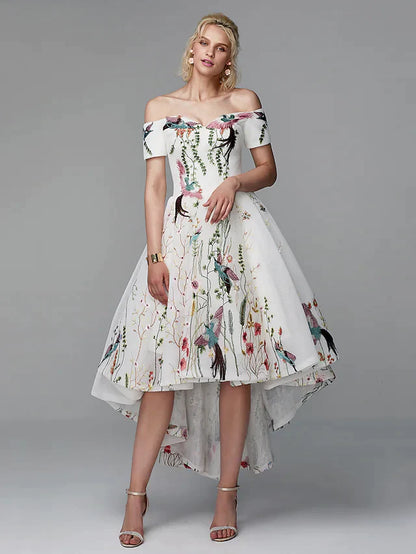 Model in elegant light blue floral embroidered off-shoulder high-low ball gown, front view.