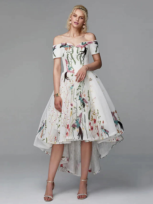 Model in elegant light blue floral embroidered off-shoulder high-low ball gown, front view.