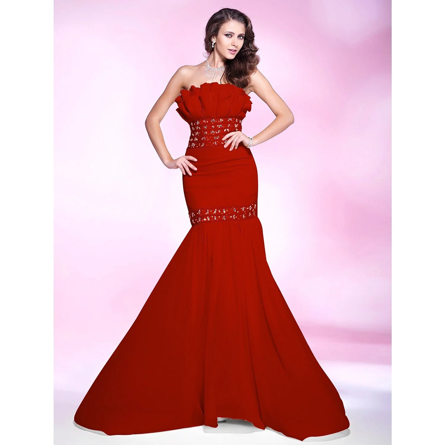 Back view of the elegant mermaid trumpet dress, highlighting the dramatic sweep train.