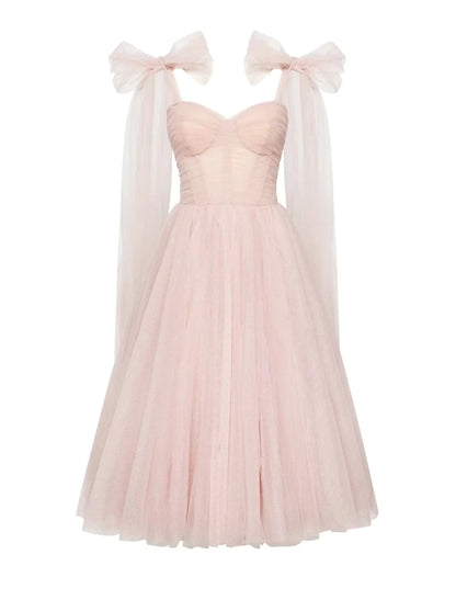 Back view of the square neck corset ball gown, showing the elegant tulle skirt.