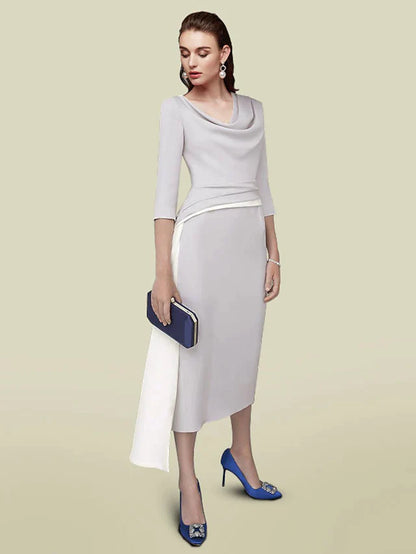 Elegant mother of the bride dress with jewel neck and half sleeves.