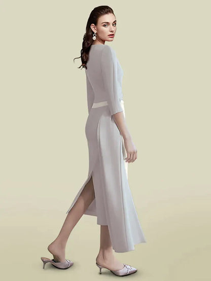 Side view of the tea-length mother of the bride dress with ruching.