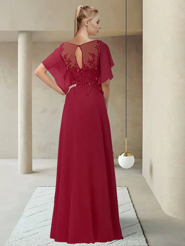 Close-up of the back of the chiffon lace dress, highlighting intricate appliques.