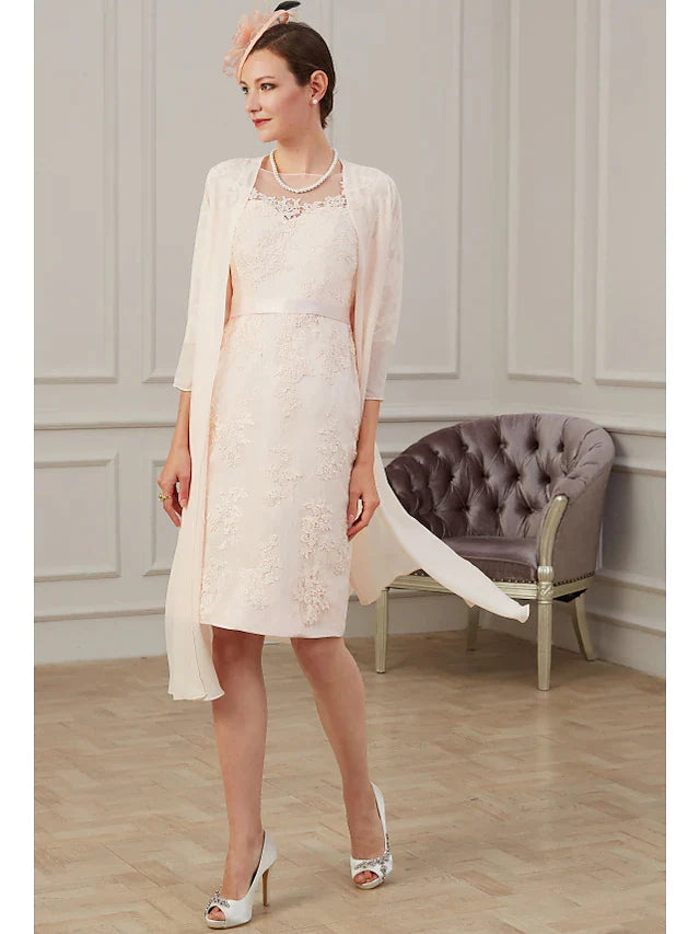 Close-up of the delicate appliques and ruching on the elegant chiffon Mother of the Bride dress.